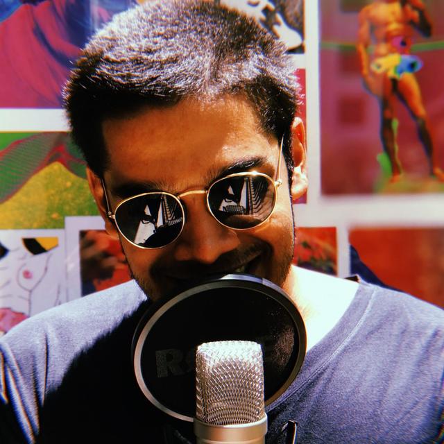 ANTSID performing — sunglasses, mic, colorful art wall behind